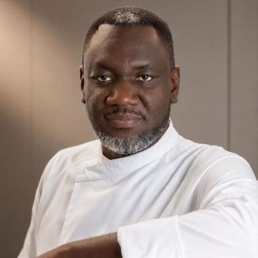 Portrait of Chef Kay styling culinary masterpieces