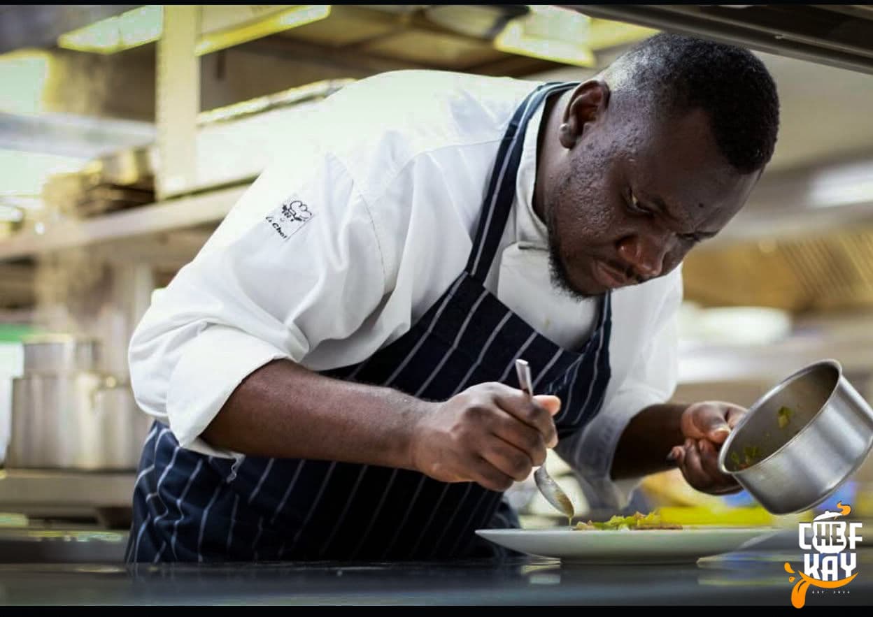 Chef Kay working active live flames